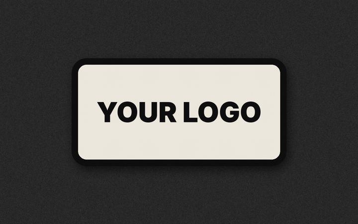 Woven badge label with stitched border